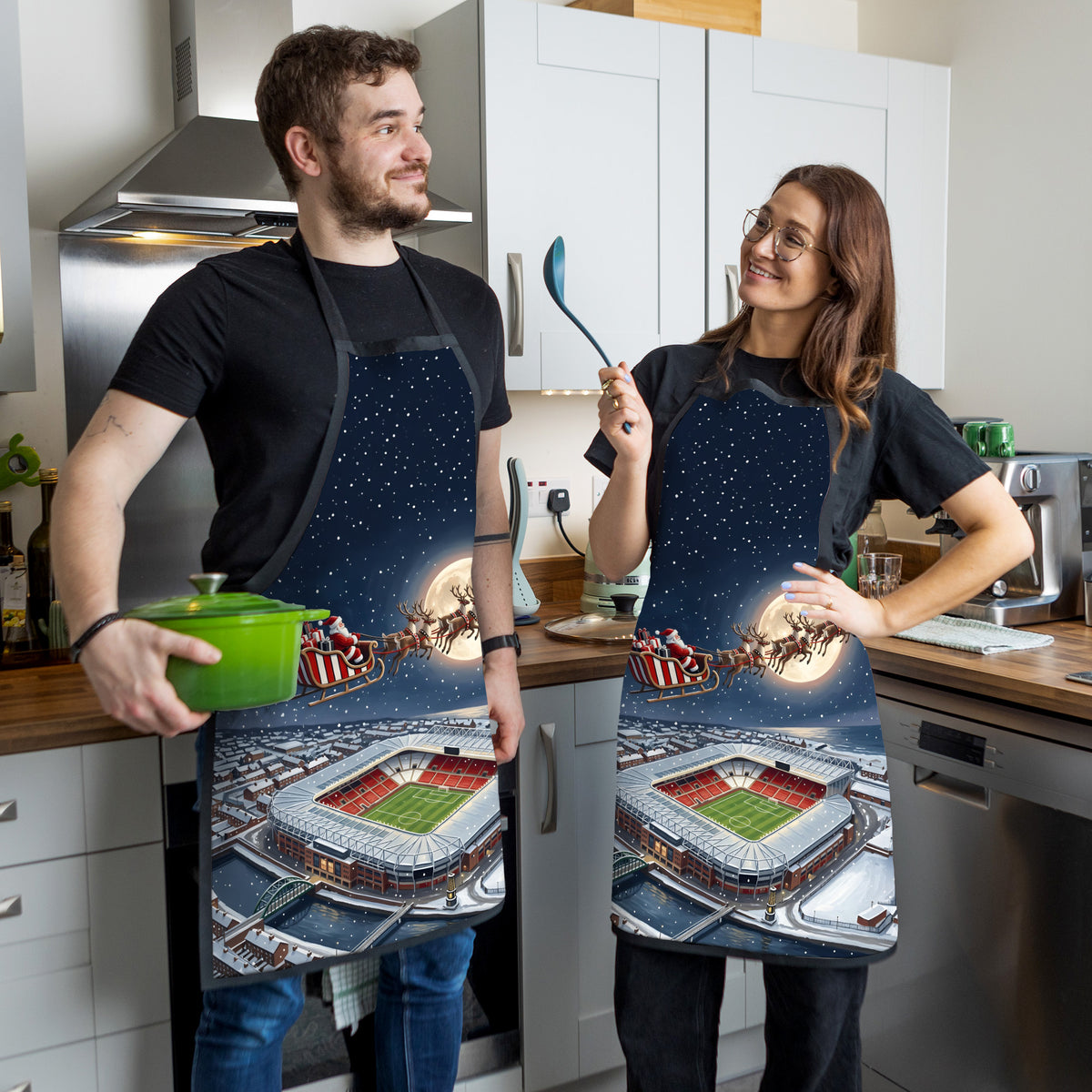 Sunderland Christmas Stadium Apron - couple in kitchen