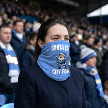 Manchester City Santa snood lifestyle photo in a football stadium